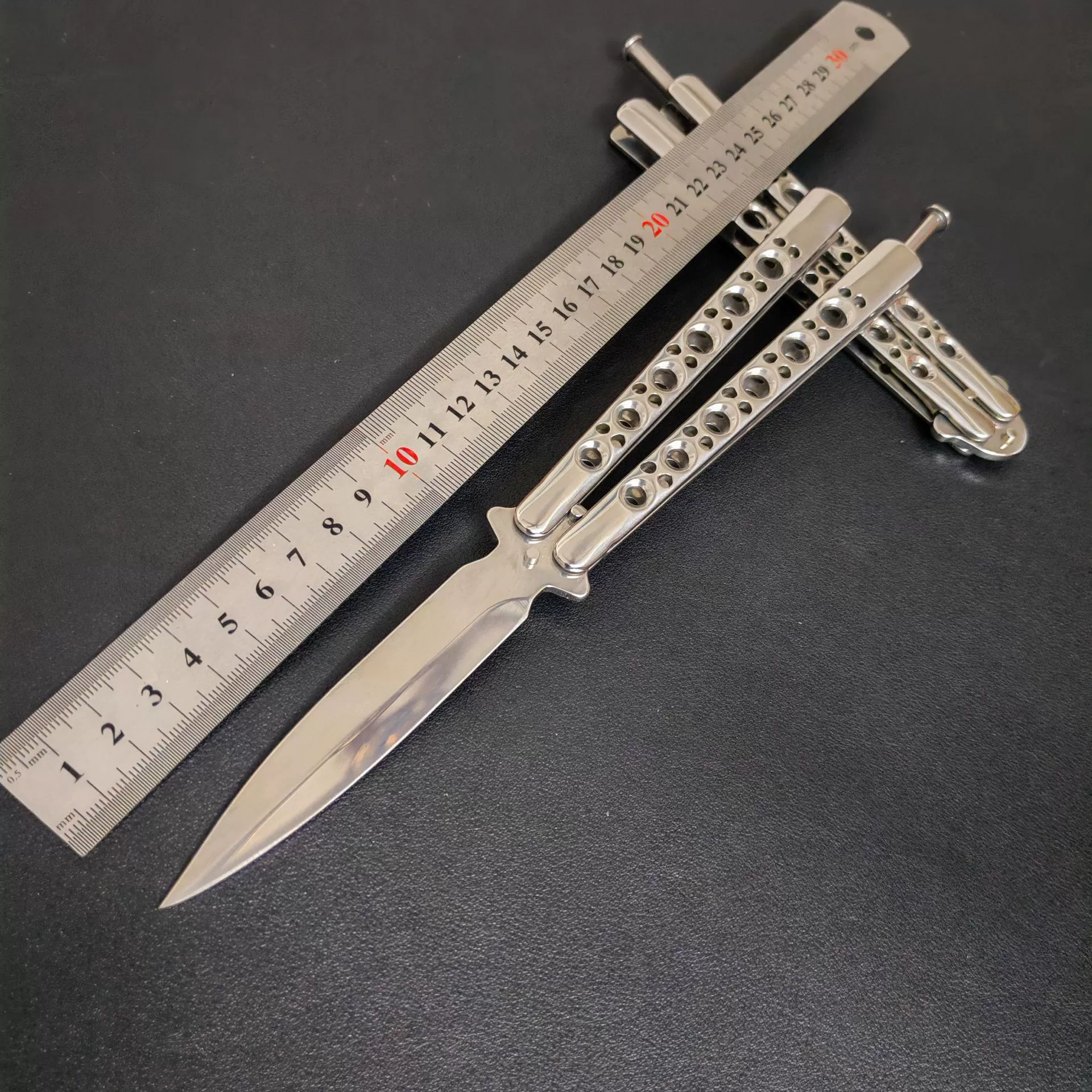 Double-Point Trainer with a mirror-finish butterfly handle